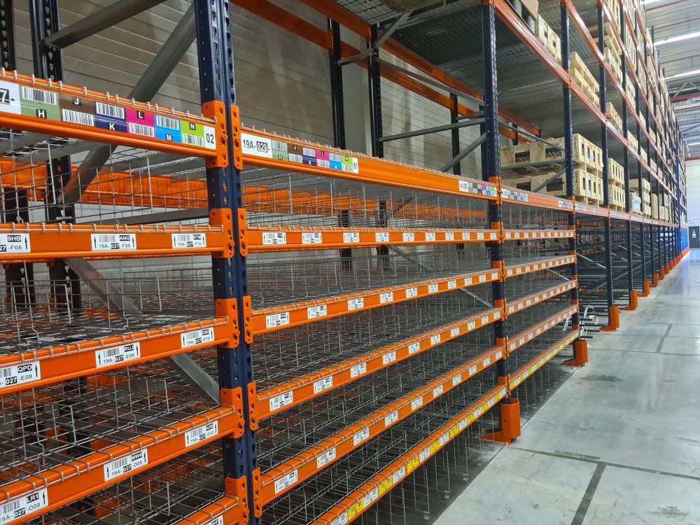 Mesh decking above order-picking levels